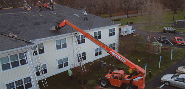 Replacement of a roof on a hotel or apartment building